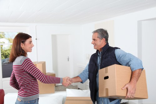 Local moving team helping with packing in a Brentford flat or apartment