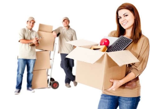 Packed office boxes and moving supplies for a Brentford business move