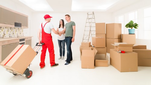 Prepared office boxes and desks ready for relocation in Brentford