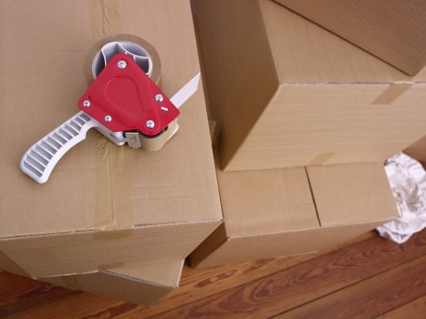 House removals team preparing furniture and boxes for a Brentford property move