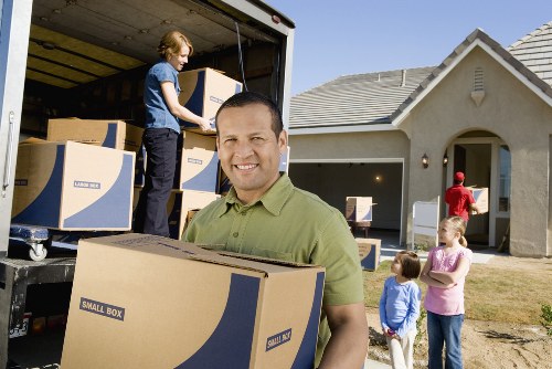 Packing and moving office furniture during a Brentford relocation
